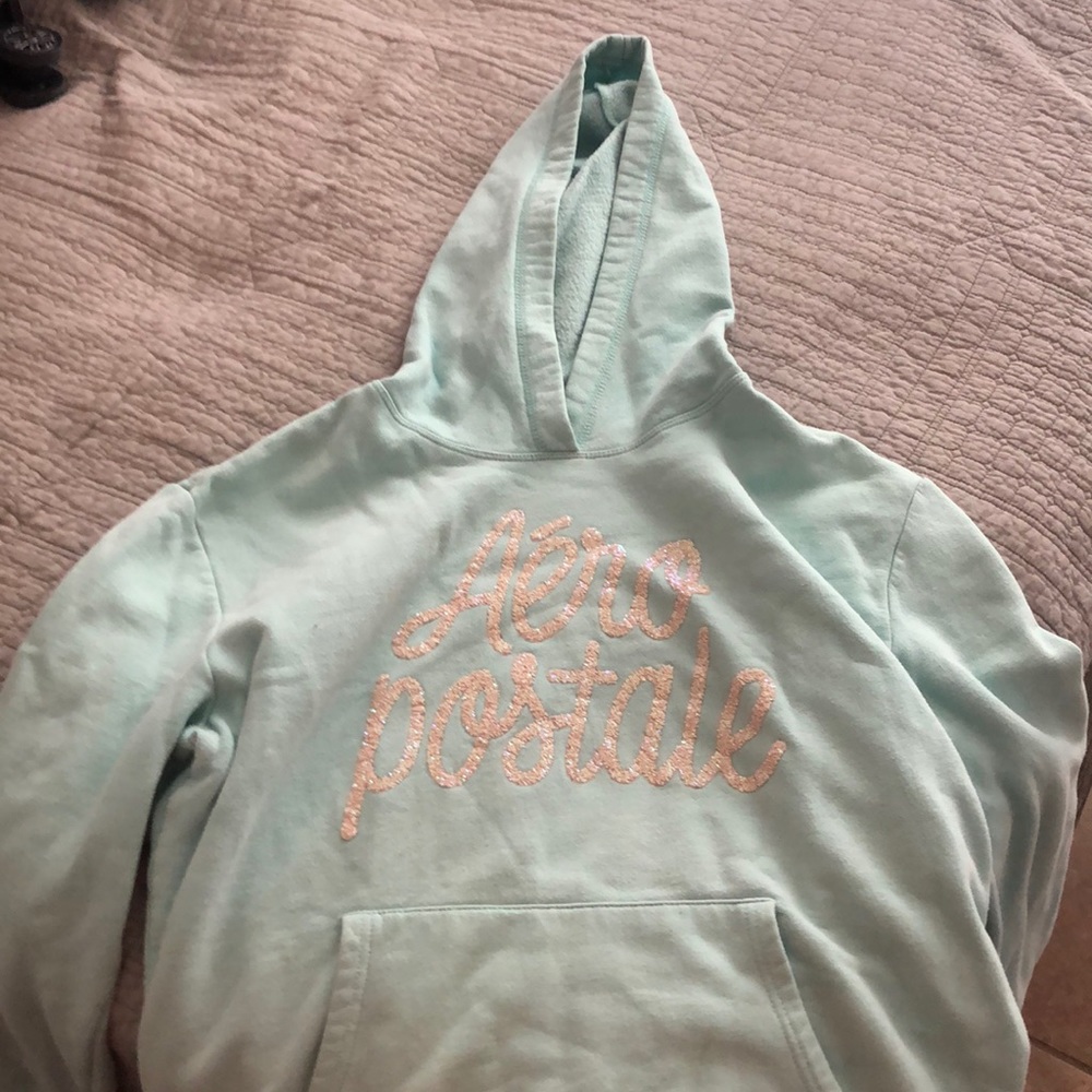 Light blue slightly with white glitter letters